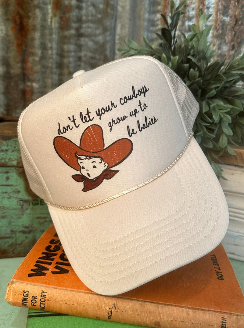 Don't let your cowboys grow up to be babies Trucker Hat in cream